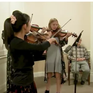 13-year-old violinist surprises 102-year-old friend with birthday serenade